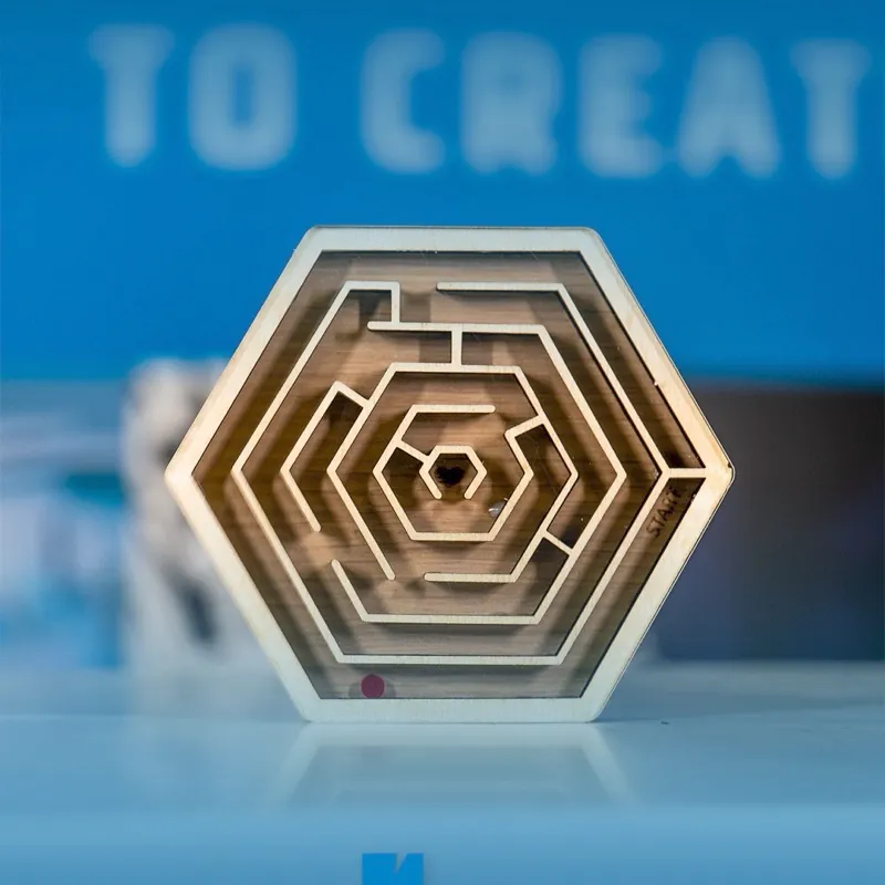 Pocket maze laser cut from acrylic and wood