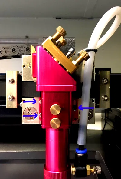 Laser head adjustment slots