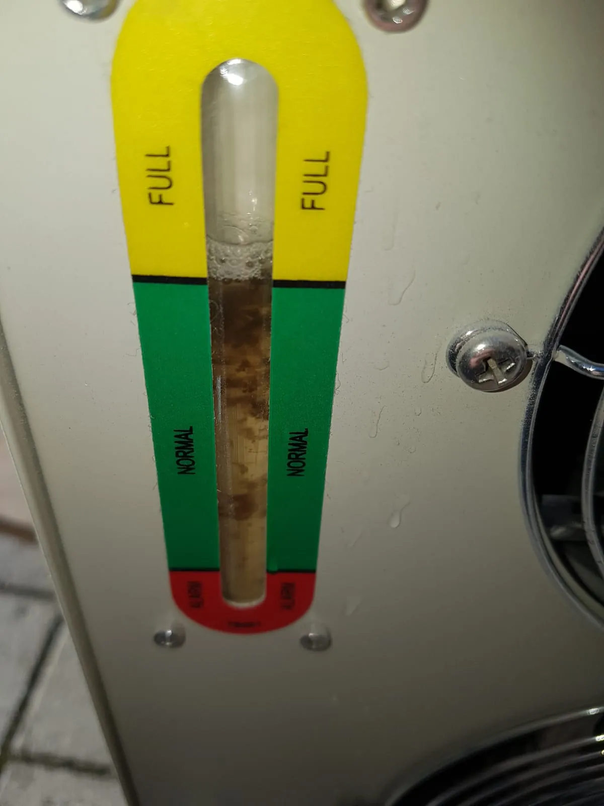 Algae visible in the water level gauge of a water chiller